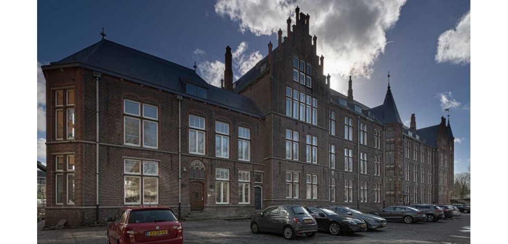 Voormalige TU-faculteit in Delft nu kantoor voor woningcorporatie DUWO